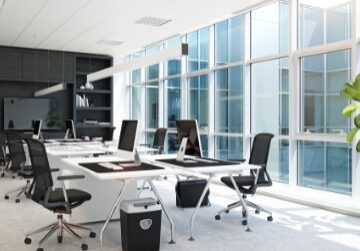 Conference room of an office with a large wall of windows